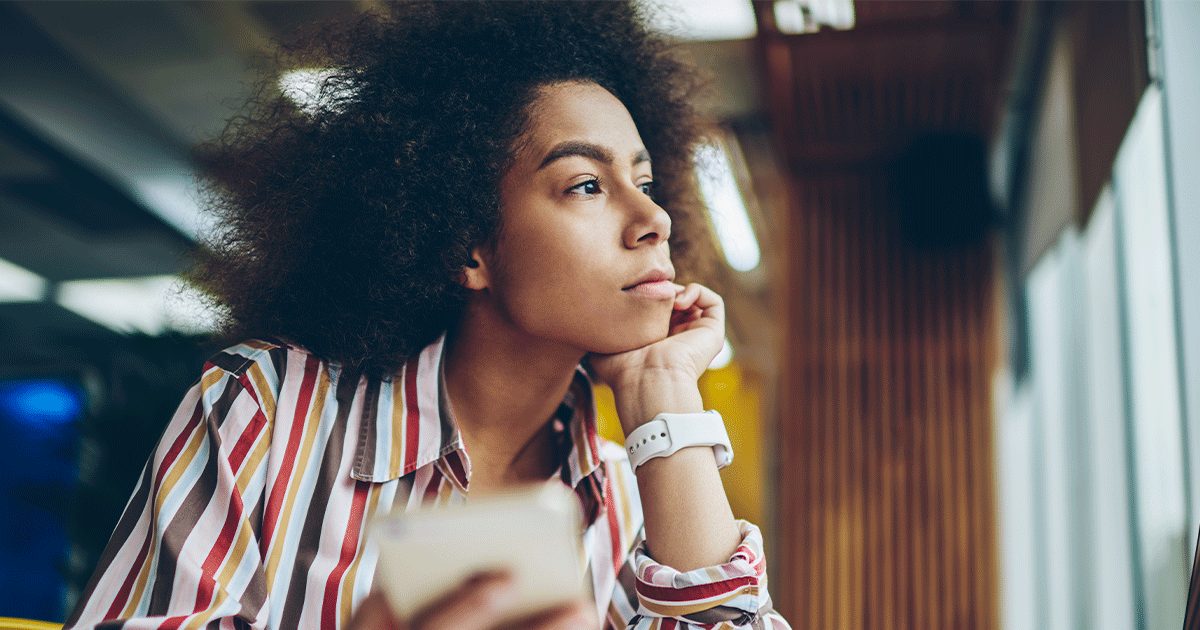 A woman experiencing stress over the holidays from pregnancy